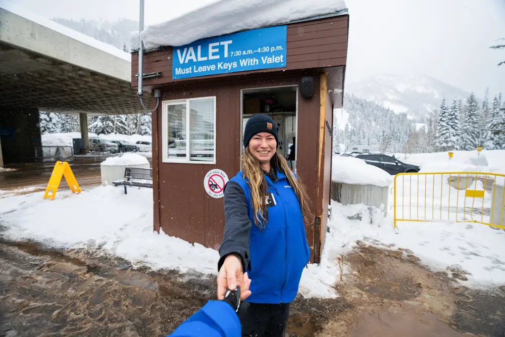 Valet parking at Snowbird, person hands keys to an employee
