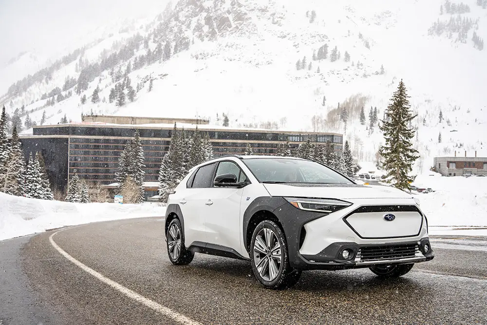 Subaru driving past the Cliff Lodge at snowbird with a preferred parking pass