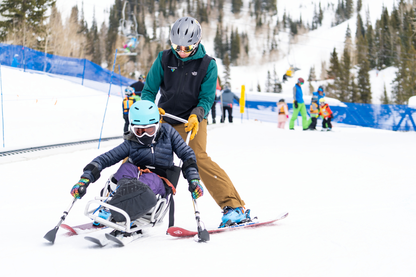 Wasatch Adaptive Student in Sit Ski and Instructor