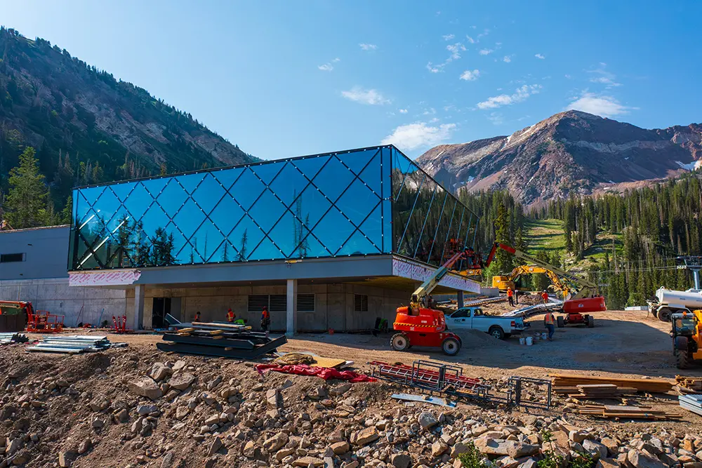 The new mid-mountain restaurant at Snowbird with views of American Fork twin peaks in the background