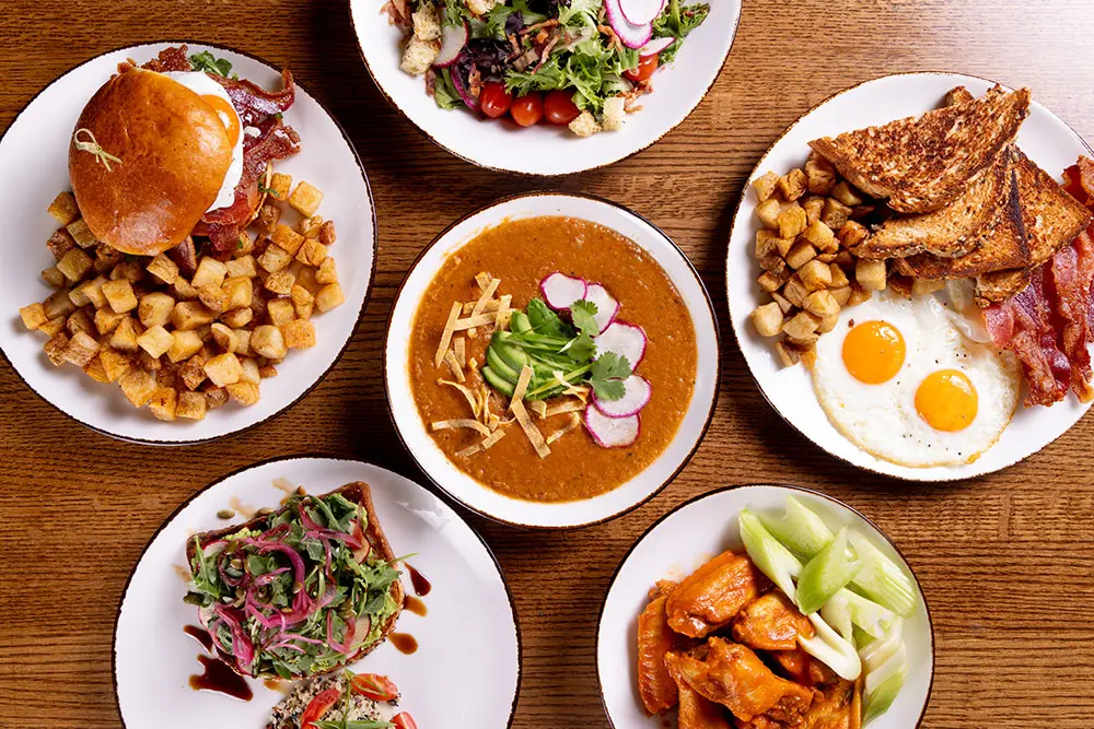 Lunch Dishes from The Forklift- a restaurant at Snowbird offering sit down breakfast and lunch. Includes soup, buffalow wings, and a burger