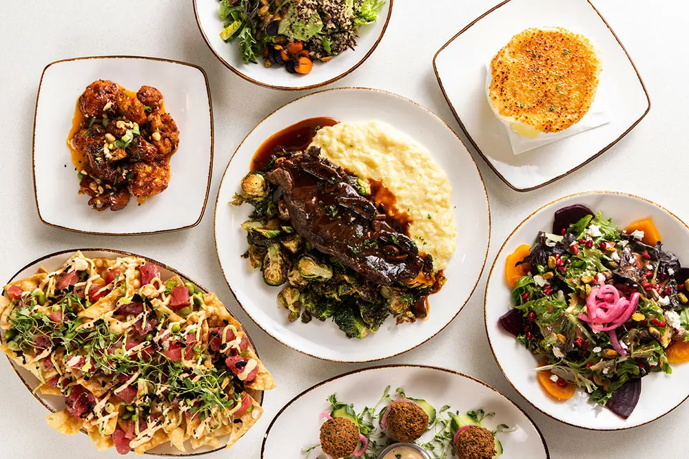 Dining options at Seventy one including steak, tuna and salad. SeventyOne is one of Snowbirds on-mountain dining options