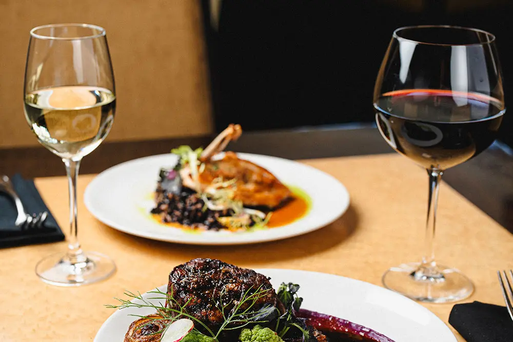 Valentine's day dinner at the Aerie, 2 places set with wine at Snowbird's high-end restaurant