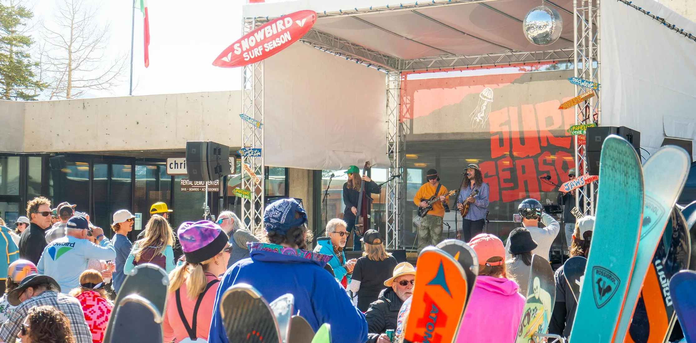 Plazaplooza stage at Snowbird with skis in the forefront