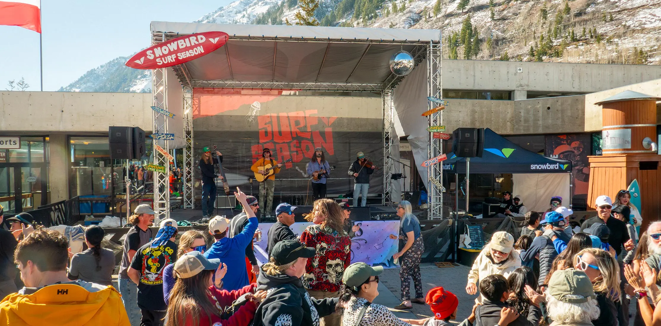 People dance on the plaza deck during Plazapalooza at Snowbird