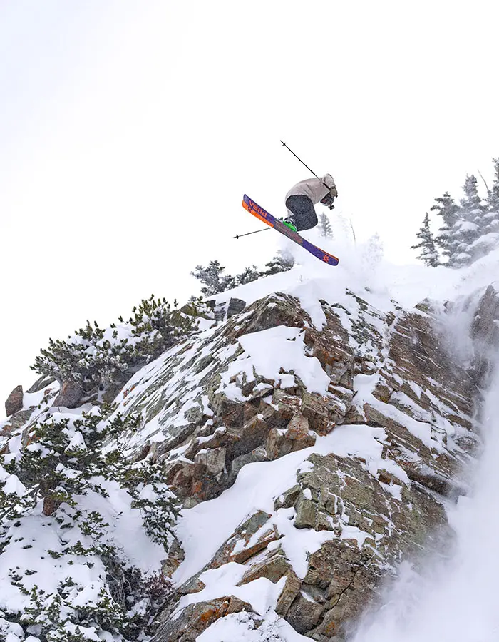 Mobile hero of an athlete hitting a cliff at Snowbird's in preperation for the new freeride world tour event at Snowbird