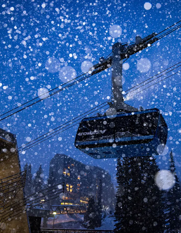 Mobile hero of tram in the dark above the cliff lodge
